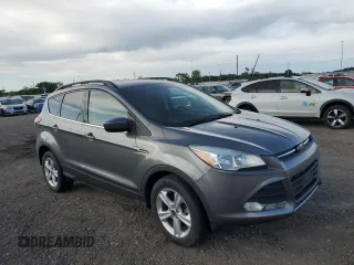 2014 Ford Escape SE z VIN 1FMCU9GX3EUE26446, wystawiony jako Copart lot #57113865 z przebiegiem 145 699 mil mil oraz Szkoda całkowita • Salvage title. Historia ofert i sprzedaży dostępna na DreamBid. Obrazek 4.