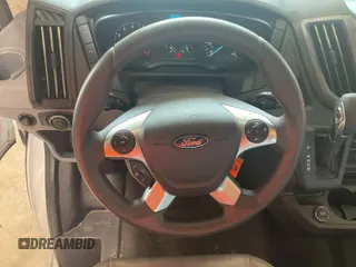 2019 Ford Transit with VIN 1FTYE1YM6KKB31880, listed as a IAAI auction lot 42792031 with 99,943 mi miles and . Bid and sale history available at DreamBid. Image 7.