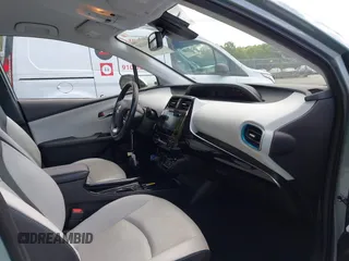 2019 Toyota Prius L Eco z VIN JTDKARFU8K3095669, wystawiony jako IAAI lot #42334160 z przebiegiem 59 882 mil mil oraz . Historia ofert i sprzedaży dostępna na DreamBid. Obrazek 5.