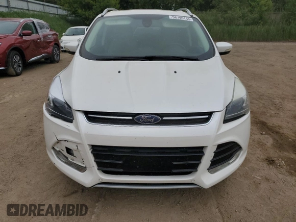 2014 Ford Escape Titanium с VIN 1FMCU0J97EUA87342, выставлен на аукционе Copart как лот 58790145 с пробегом 174 663 миль миль и Чистый • Clean title. История ставок и продаж доступна на DreamBid. Изображение 5.