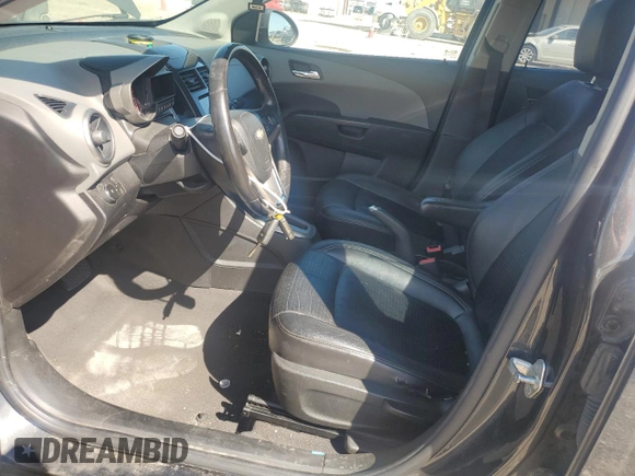 2014 Chevrolet Sonic LTZ with VIN 1G1JE5SB9E4103444, listed as a Copart auction lot 46949955 with 120,986 mi miles and Clean Title. Bid and sale history available at carsss.com. Image 7.