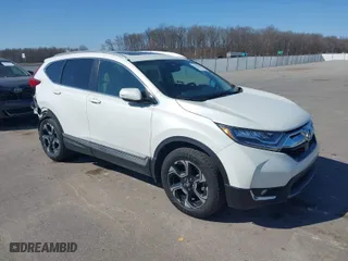 2018 Honda CR-V Touring with VIN 2HKRW2H96JH655742, listed as a IAAI auction lot 41763219 with 64,846 mi miles. Bid and sale history available at carsss.com. Image 1.