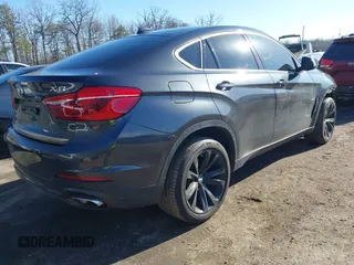 2019 BMW X6 xDrive35i z VIN 5UXKU2C51K0Z64589, wystawiony jako IAAI lot #41537380 z przebiegiem 60 769 mil mil oraz . Historia ofert i sprzedaży dostępna na DreamBid. Obrazek 4.