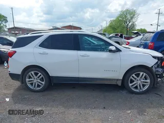 2019 Chevrolet Equinox Premier with VIN 3GNAXYEX7KS502799, listed as a IAAI auction lot 42102610 with 73,575 mi miles and . Bid and sale history available at DreamBid. Image 14.