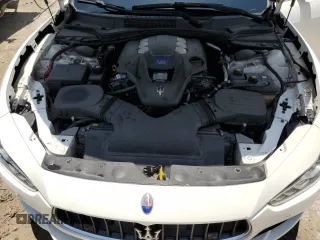 2014 Maserati Ghibli S Q4 z VIN ZAM57RTA1E1126438, wystawiony jako Copart lot #58388215 z przebiegiem 95 167 mil mil oraz Tytuł czysty. Historia ofert i sprzedaży dostępna na DreamBid. Obrazek 11.