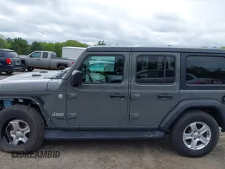 2020 Jeep Wrangler Unlimited Black and Tan with VIN 1C4HJXDG5LW187222, listed as a IAAI auction lot 42238194 with 9,237 mi miles and . Bid and sale history available at DreamBid. Image 14.