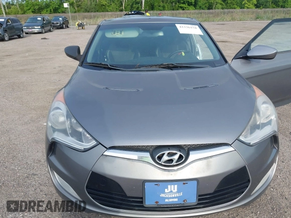 2013 Hyundai Veloster w/Gray Int with VIN KMHTC6AD3DU118515, listed as a IAAI auction lot 42336158 with 109,563 mi miles and . Bid and sale history available at DreamBid. Image 6.