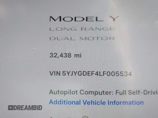 2020 Tesla Model Y Long Range with VIN 5YJYGDEF4LF005534, listed as a IAAI auction lot 41830910 with 32,438 mi miles and . Bid and sale history available at DreamBid. Image 14.