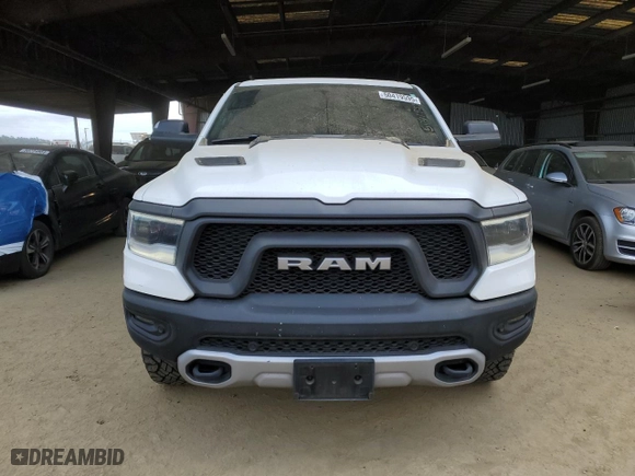 2019 Ram 1500 Rebel with VIN 1C6SRFLTXKN618849, listed as a Copart auction lot 50419595 with 98,219 mi miles and Salvage Title. Bid and sale history available at carsss.com. Image 5.