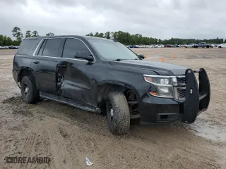 2016 Chevrolet Tahoe Commercial with VIN 1GNSKFEC8GR251595, listed as a Copart auction lot 70221954 with 169,234 mi miles and Salvage Title. Bid and sale history available at carsss.com. Image 4.