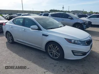 2013 Kia Optima SX with VIN 5XXGR4A62DG233168, listed as a IAAI auction lot 41820220 with 153,526 mi miles. Bid and sale history available at carsss.com. Image 1.