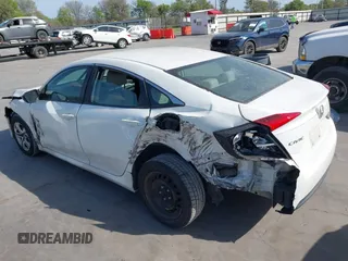 2016 Honda Civic Sedan LX with VIN 19XFC2F50GE059955, listed as a IAAI auction lot 41818158 with 123,282 mi miles. Bid and sale history available at carsss.com. Image 3.