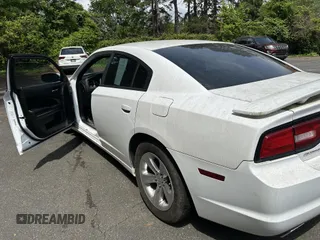 2014 Dodge Charger SE with VIN 2C3CDXBG8EH187998, listed as a IAAI auction lot 42175958 with 135,388 mi miles and . Bid and sale history available at carsss.com. Image 3.