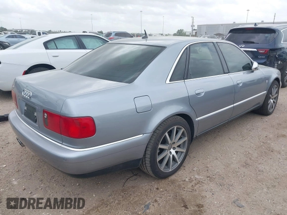 2003 Audi S8 z VIN WAUGU44D33N002014, wystawiony jako IAAI lot #41941237 z przebiegiem Nie podano mil oraz . Historia ofert i sprzedaży dostępna na DreamBid. Obrazek 4.