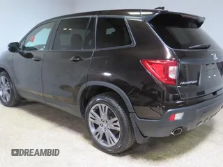2019 Honda Passport EX-L с VIN 5FNYF7H54KB000839, выставлен на аукционе Copart как лот 65446225 с пробегом 86 804 миль миль и Списание • Salvage title. История ставок и продаж доступна на DreamBid. Изображение 4.