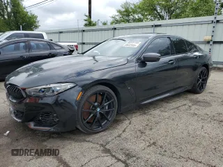 2022 BMW 8 Series M850i z VIN WBAGV8C02NCK08667, wystawiony jako Copart lot #55632805 z przebiegiem 22 737 mil mil oraz Szkody całkowita. Historia ofert i sprzedaży dostępna na DreamBid. Obrazek 1.