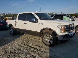 2018 Ford F-150 XL with VIN 1FTEW1EG5JFB38812, listed as a Copart auction lot 52882615 with 137,106 mi miles and Salvage Title. Bid and sale history available at carsss.com. Image 4.
