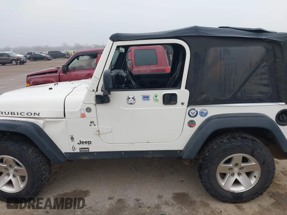 2006 Jeep Wrangler Rubicon with VIN 1J4FA69S16P710601, listed as a IAAI auction lot 41475818 with Not provided miles and . Bid and sale history available at DreamBid. Image 14.