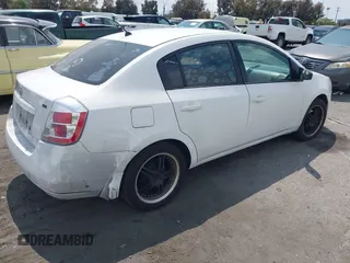 2009 Nissan Sentra S with VIN 3N1AB61E29L639804, listed as a IAAI auction lot 42074055 with 133,358 mi miles and . Bid and sale history available at DreamBid. Image 4.