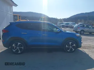 2016 Hyundai Tucson Eco with VIN KM8J3CA24GU054350, listed as a IAAI auction lot 41983769 with 132,424 mi miles. Bid and sale history available at carsss.com. Image 13.