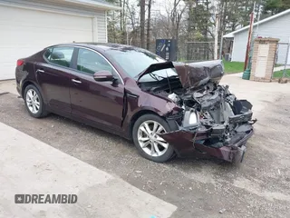 2013 Kia Optima EX with VIN 5XXGN4A79DG240428, listed as a IAAI auction lot 42017665 with 94,765 mi miles. Bid and sale history available at carsss.com. Image 1.