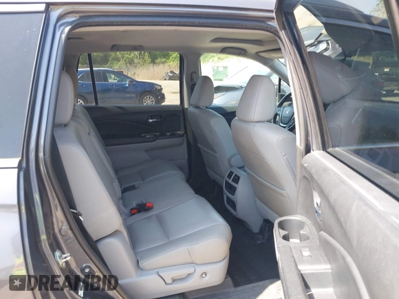 2016 Honda Pilot EX-L with VIN 5FNYF6H54GB083139, listed as a IAAI auction lot 42150923 with 213,009 mi miles and . Bid and sale history available at DreamBid. Image 8.
