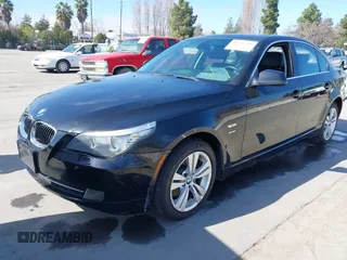 2010 BMW 5 Series 528i xDrive with VIN WBANV1C59AC159682, listed as a IAAI auction lot 41676268 with 104,048 mi miles and . Bid and sale history available at carsss.com. Image 2.