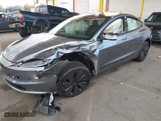 2025 Tesla Model 3 Long Range with VIN 5YJ3E1EBXSF912475, listed as a IAAI auction lot 41449488 with 3,100 mi miles. Bid and sale history available at carsss.com. Image 2.