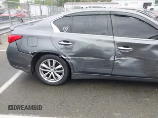 2016 Infiniti Q50 Premium z VIN JN1EV7AR1GM344827, wystawiony jako IAAI lot #41953405 z przebiegiem 123 952 mil mil oraz . Historia ofert i sprzedaży dostępna na DreamBid. Obrazek 17.