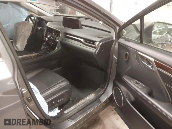 2019 Lexus RX with VIN 2T2BZMCA5KC197990, listed as a IAAI auction lot 41739917 with 74,469 mi miles. Bid and sale history available at carsss.com. Image 5.