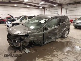 2017 Ford Escape Titanium with VIN 1FMCU9JD7HUE46427, listed as a IAAI auction lot 41808083 with 55,201 mi miles. Bid and sale history available at carsss.com. Image 2.