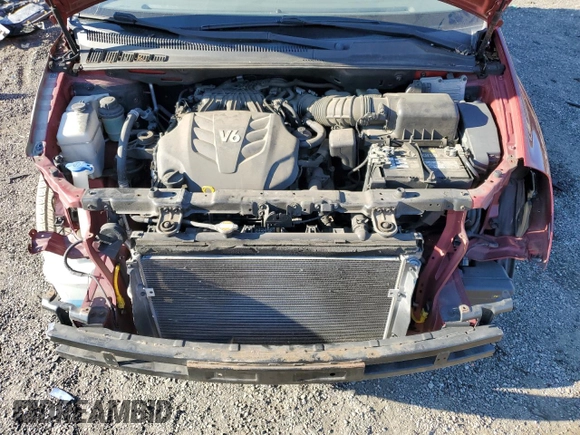 2012 Kia Sedona LX with VIN KNDMG4C77C6503605, listed as a Copart auction lot 77481894 with 103,026 mi miles and Salvage Title. Bid and sale history available at carsss.com. Image 12.