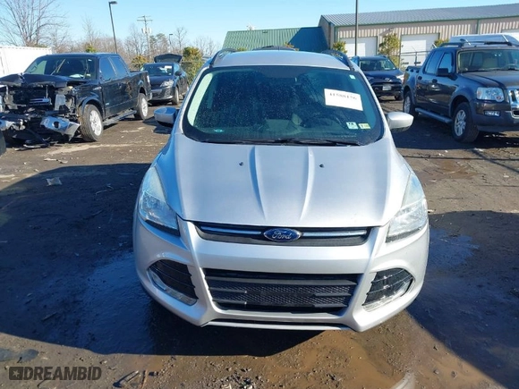 2015 Ford Escape SE with VIN 1FMCU0G95FUC07678, listed as a IAAI auction lot 41588156 with 71,388 mi miles. Bid and sale history available at carsss.com. Image 13.