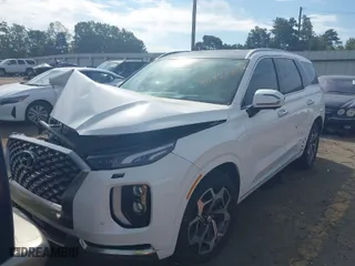 2022 Hyundai Palisade Calligraphy with VIN KM8R7DHE5NU418978, listed as a IAAI auction lot 40421814 with 54,357 mi miles. Bid and sale history available at carsss.com. Image 2.