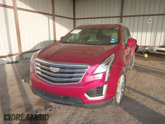 2019 Cadillac XT5 Premium Luxury FWD z VIN 1GYKNERS0KZ157287, wystawiony jako IAAI lot #41106524 z przebiegiem 131 464 mil mil oraz . Historia ofert i sprzedaży dostępna na DreamBid. Obrazek 17.