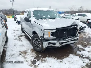 2018 Ford F-150 XL with VIN 1FTFW1E54JKC59793, listed as a IAAI auction lot 41558134 with 217,831 mi miles. Bid and sale history available at carsss.com. Image 1.