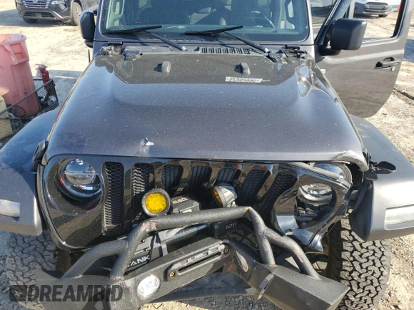 2022 Jeep Wrangler Unlimited Willys with VIN 1C4HJXDG1NW102069, listed as a Copart auction lot 52353995 with 33,328 mi miles and Salvage Title. Bid and sale history available at DreamBid. Image 12.