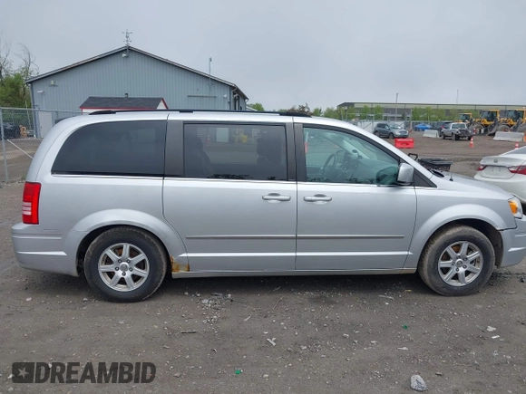 2010 Chrysler Town & Country Touring with VIN 2A4RR5D14AR271397, listed as a IAAI auction lot 42181231 with 200,547 mi miles and . Bid and sale history available at DreamBid. Image 13.
