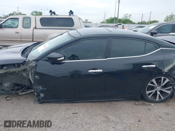 2018 Nissan Maxima SV with VIN 1N4AA6AP1JC392640, listed as a IAAI auction lot 41911036 with Not Provided miles and . Bid and sale history available at DreamBid. Image 14.