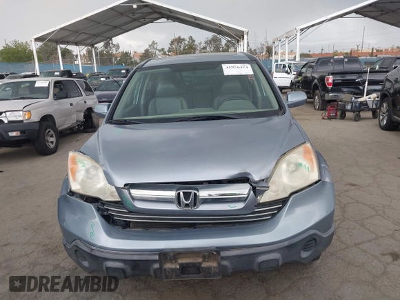 2009 Honda CR-V EX-L with VIN JHLRE38759C002661, listed as a IAAI auction lot 41956424 with 162,685 mi miles and . Bid and sale history available at carsss.com. Image 12.