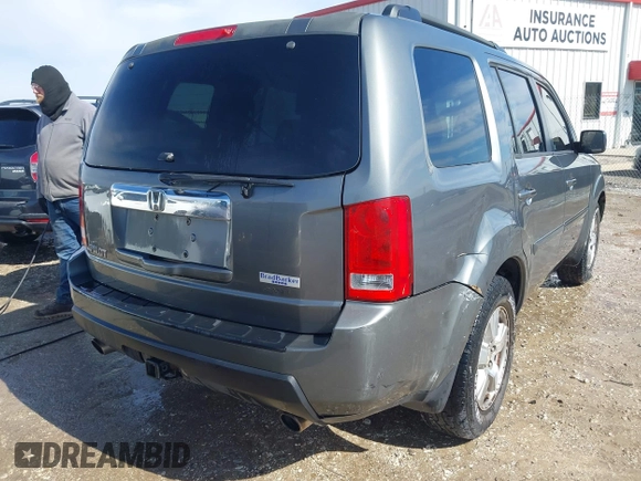 2009 Honda Pilot EX with VIN 5FNYF48469B003449, listed as a IAAI auction lot 41633525 with 190,462 mi miles. Bid and sale history available at carsss.com. Image 4.