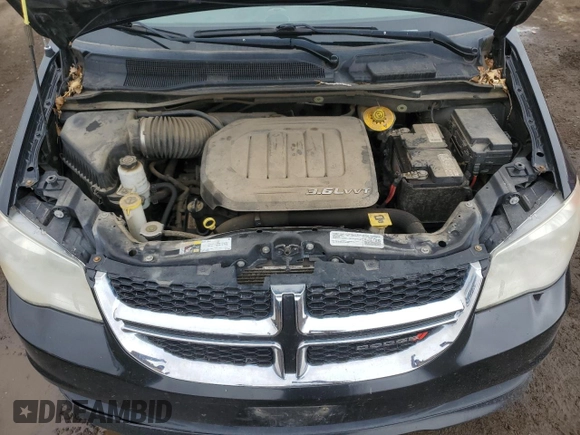 2015 Dodge Grand Caravan SE with VIN 2C4RDGBG7FR516773, listed as a Copart auction lot 52035135 with 132,122 mi miles and Salvage Title. Bid and sale history available at DreamBid. Image 12.