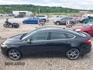 2013 Ford Fusion Titanium with VIN 3FA6P0K95DR153437, listed as a IAAI auction lot 42334754 with 139,623 mi miles and . Bid and sale history available at DreamBid. Image 14.