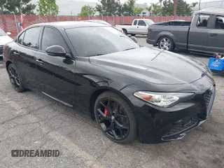 2021 Alfa Romeo Giulia Ti Sport with VIN ZARFAMBN5M7645723, listed as a IAAI auction lot 42057861 with 63,594 mi miles and . Bid and sale history available at DreamBid. Image 1.