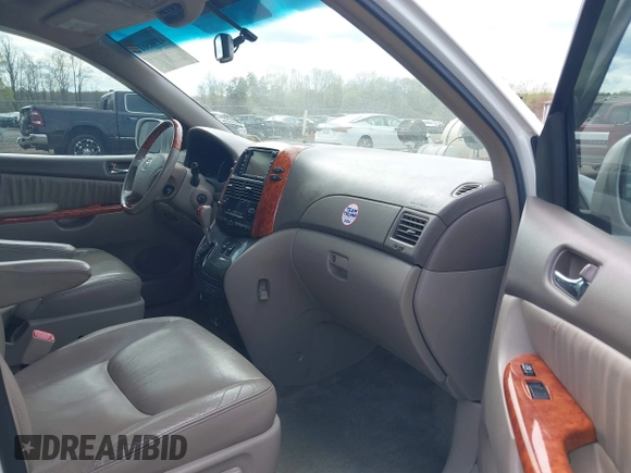2009 Toyota Sienna XLE with VIN 5TDZK22C79S259793, listed as a IAAI auction lot 41905617 with 185,121 mi miles and . Bid and sale history available at DreamBid. Image 5.