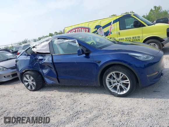 2022 Tesla Model Y Long Range z VIN 7SAYGDEE3NF455544, wystawiony jako IAAI lot #42123963 z przebiegiem 23 882 mil mil oraz . Historia ofert i sprzedaży dostępna na DreamBid. Obrazek 13.