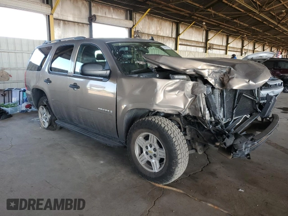 2007 Chevrolet Tahoe LS with VIN 1GNFC13C77R357122, listed as a Copart auction lot 53923835 with 139,996 mi miles and Salvage title. Bid and sale history available at DreamBid. Image 4.