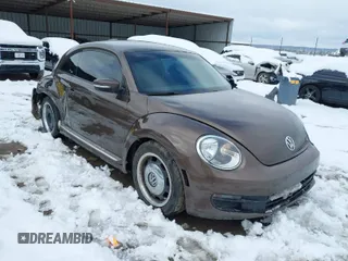 2012 Volkswagen Beetle 2.5L PZEV with VIN 3VWJP7AT2CM630201, listed as a IAAI auction lot 41293725 with 129,150 mi miles. Bid and sale history available at carsss.com. Image 1.