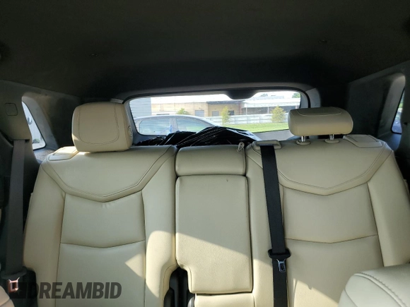 2017 Cadillac XT5 FWD with VIN 1GYKNARS0HZ283618, listed as a Copart auction lot 61640005 with 113,823 mi miles and Salvage title. Bid and sale history available at DreamBid. Image 10.