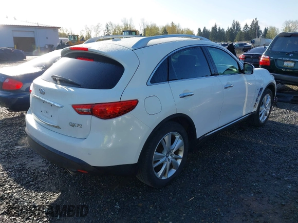 2014 Infiniti QX70 with VIN JN8CS1MW2EM411237, listed as a IAAI auction lot 42011806 with 148,133 mi miles and . Bid and sale history available at carsss.com. Image 4.